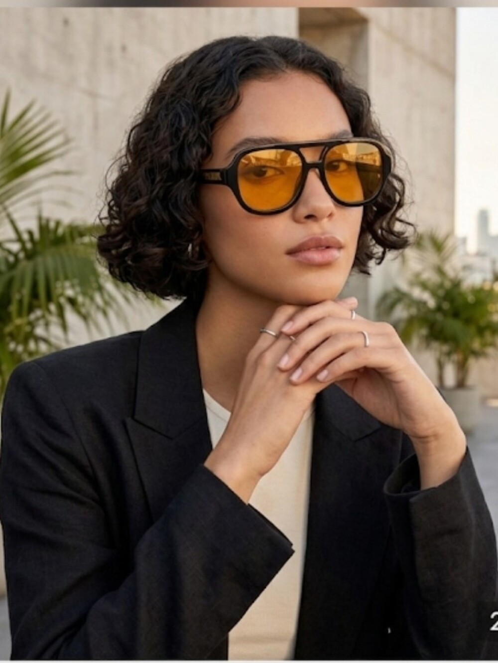 Poppy LISSIMAN Black Frame Sunglasses with Amber Lenses